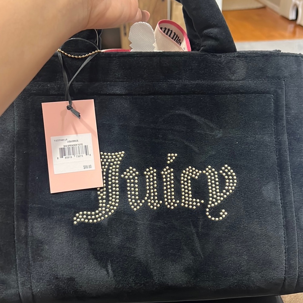 Juicy couture spender bag, check the video